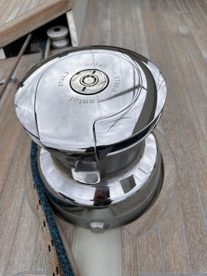 a metal object on a wood surface aboard KARMA Yacht for Sale