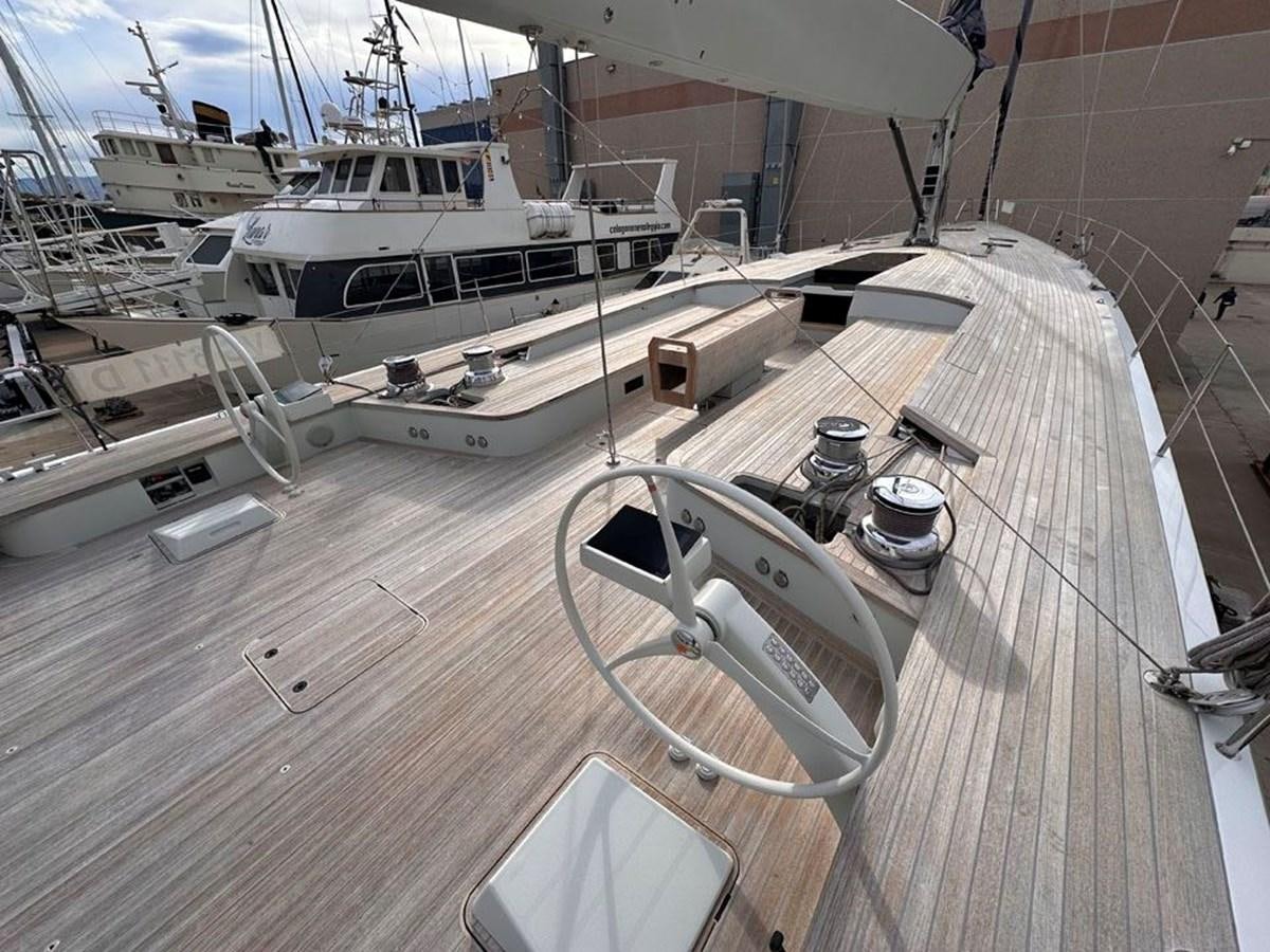 a deck with a deck of boats aboard KARMA Yacht for Sale