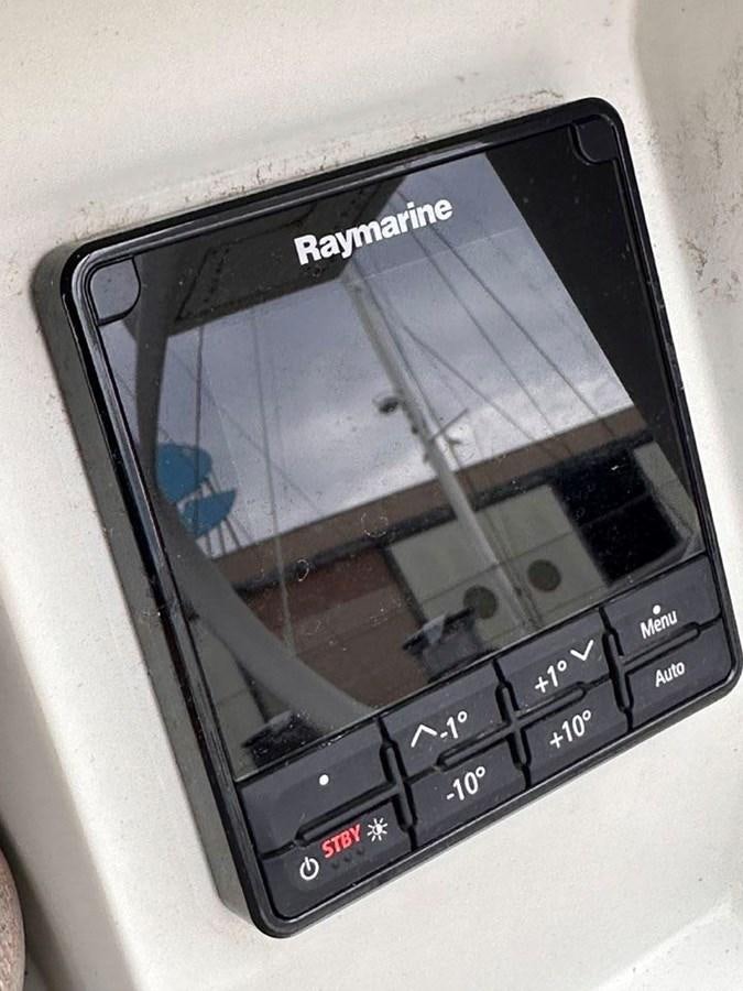a close-up of a phone aboard KARMA Yacht for Sale