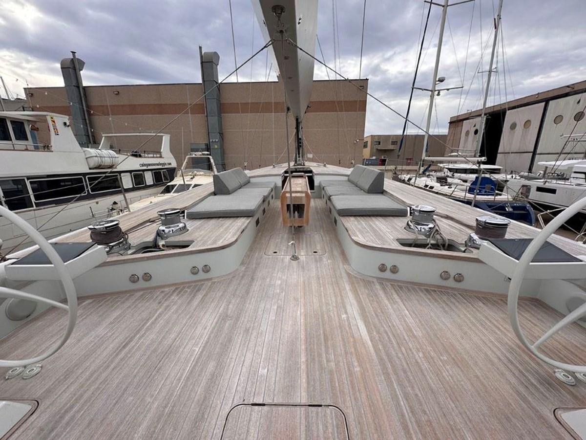 a deck with several boats aboard KARMA Yacht for Sale