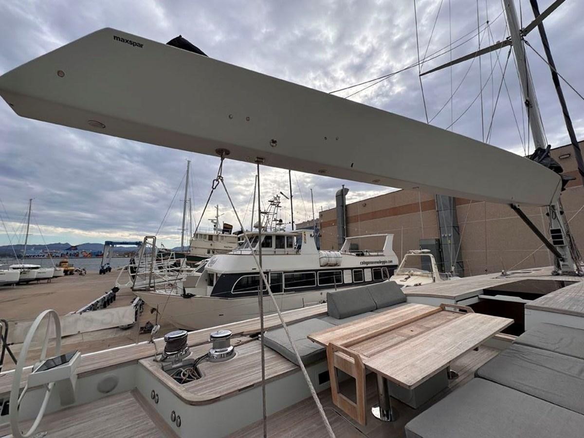 a boat docked at a pier aboard KARMA Yacht for Sale