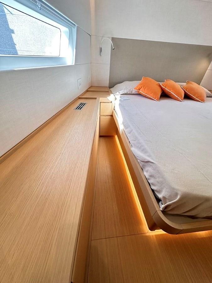 a room with two beds aboard KARMA Yacht for Sale