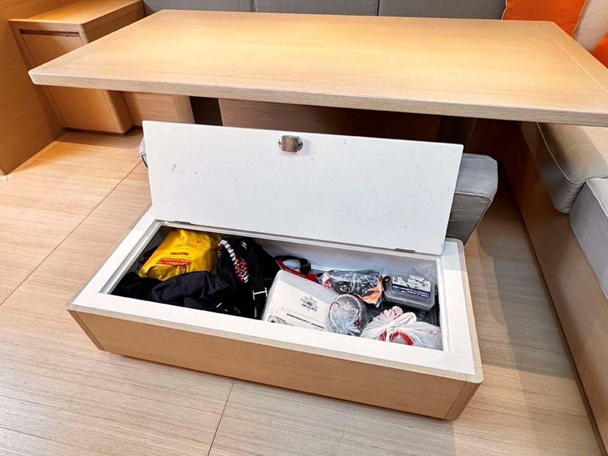 a box with a group of objects inside aboard KARMA Yacht for Sale