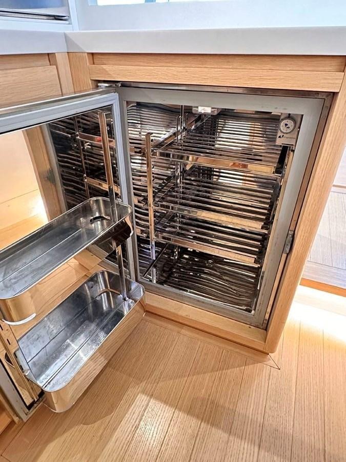 a shelf with a vent aboard KARMA Yacht for Sale