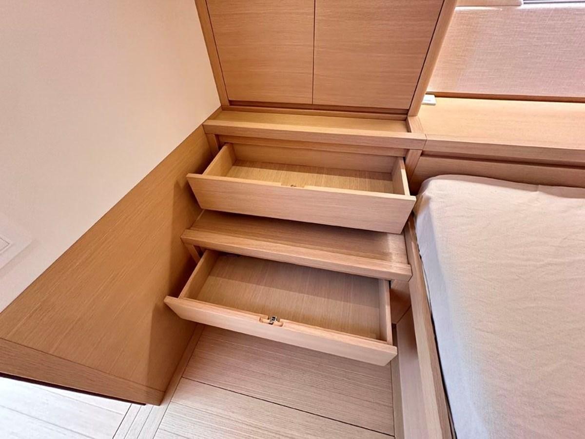 a wooden stair case aboard KARMA Yacht for Sale