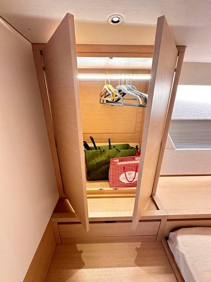 a room with a glass door aboard KARMA Yacht for Sale