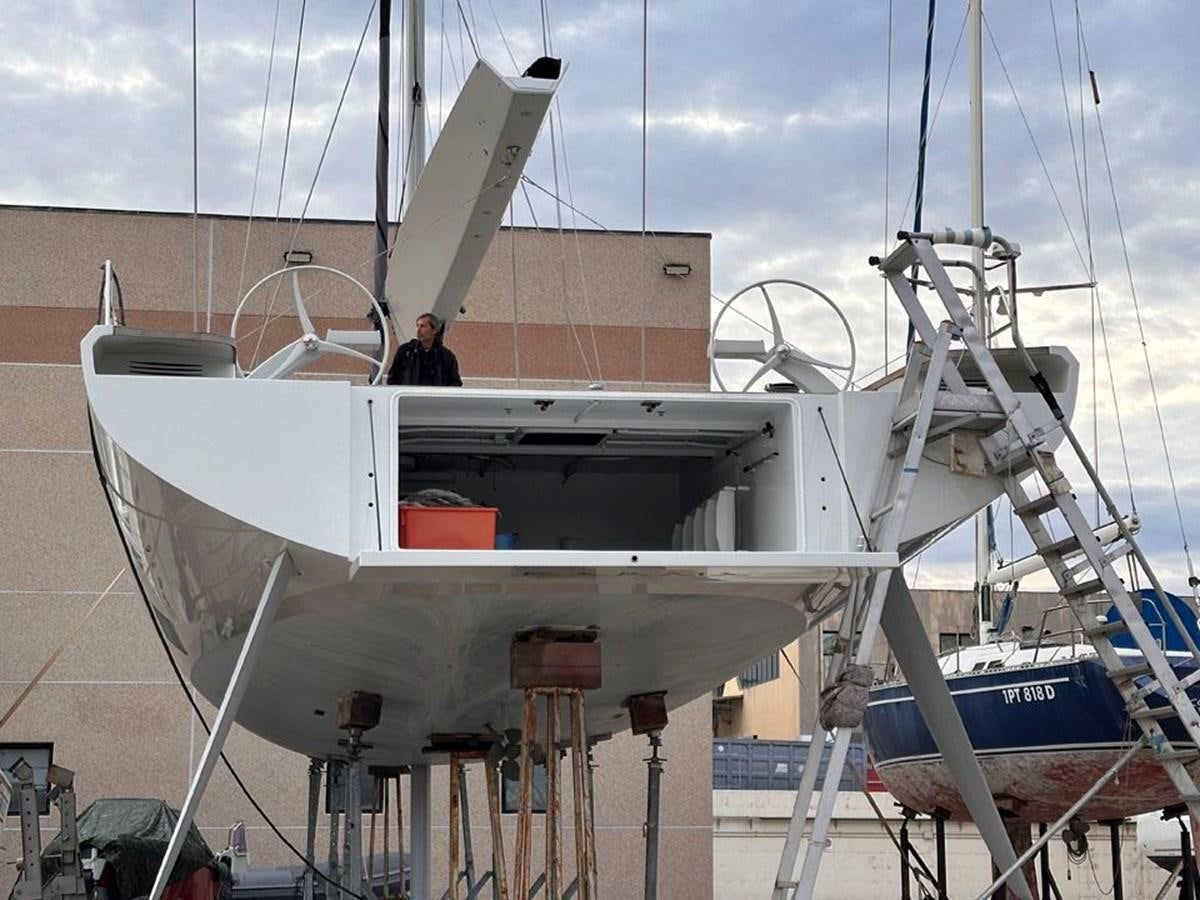 a person standing on a boat aboard KARMA Yacht for Sale