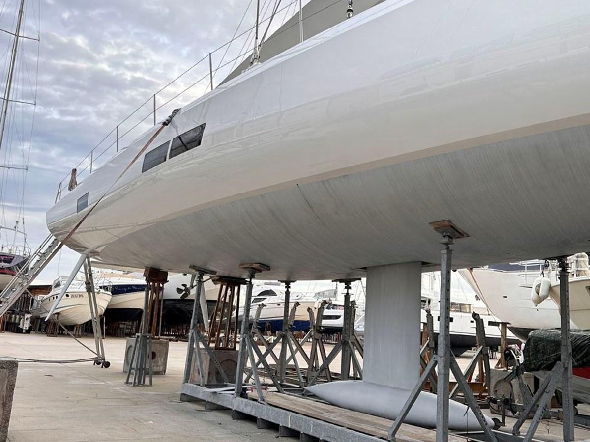 a large white boat aboard KARMA Yacht for Sale