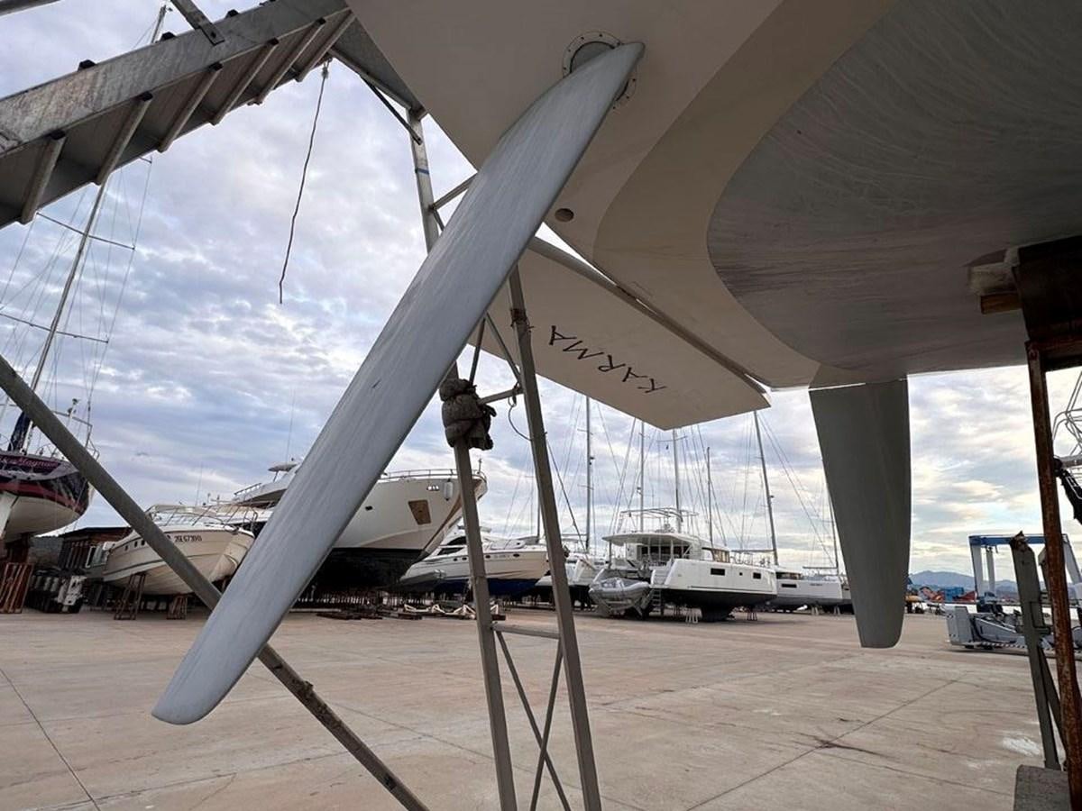 a large white object with a black line on it aboard KARMA Yacht for Sale