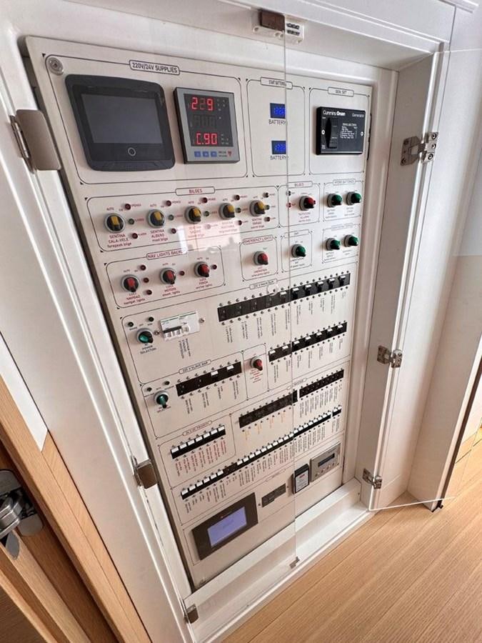 a white refrigerator with many buttons aboard KARMA Yacht for Sale
