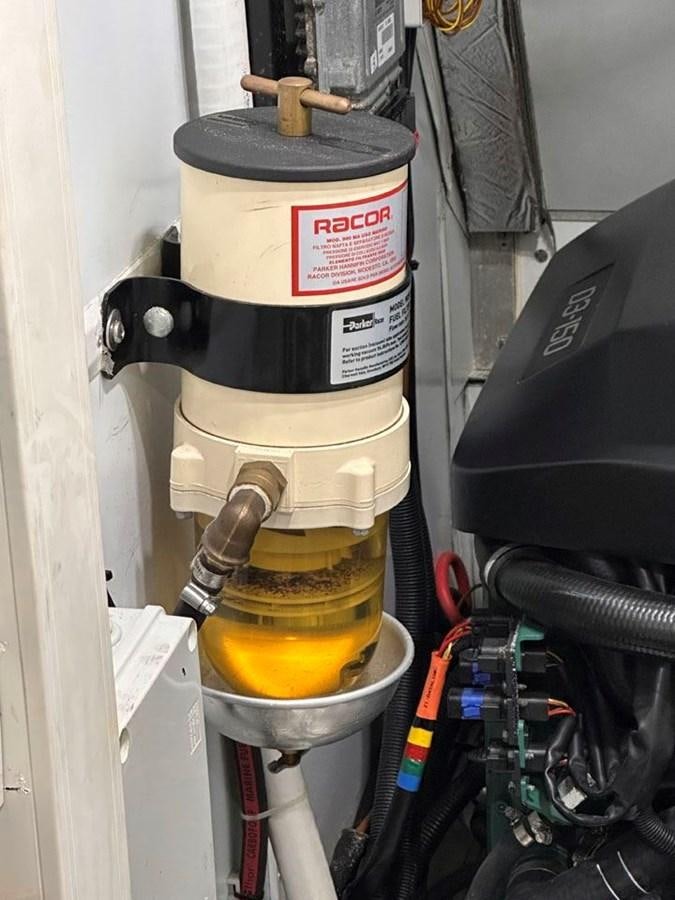 a fire hydrant with a hose attached to it aboard KARMA Yacht for Sale