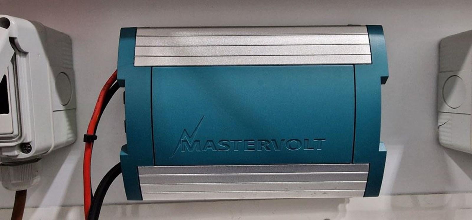 a white box with a blue screen and red and black letters on it aboard KARMA Yacht for Sale