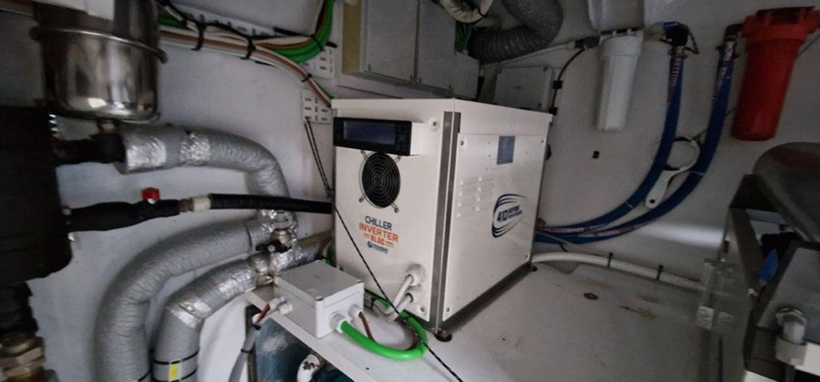 a machine with a large piece of equipment on it aboard KARMA Yacht for Sale