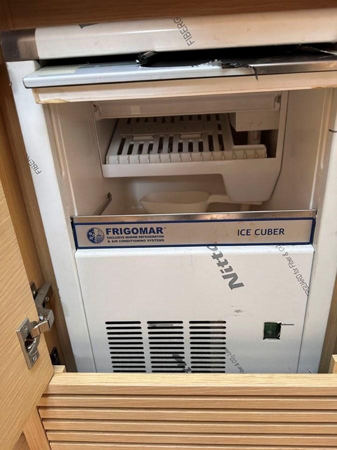 a white and silver oven aboard KARMA Yacht for Sale