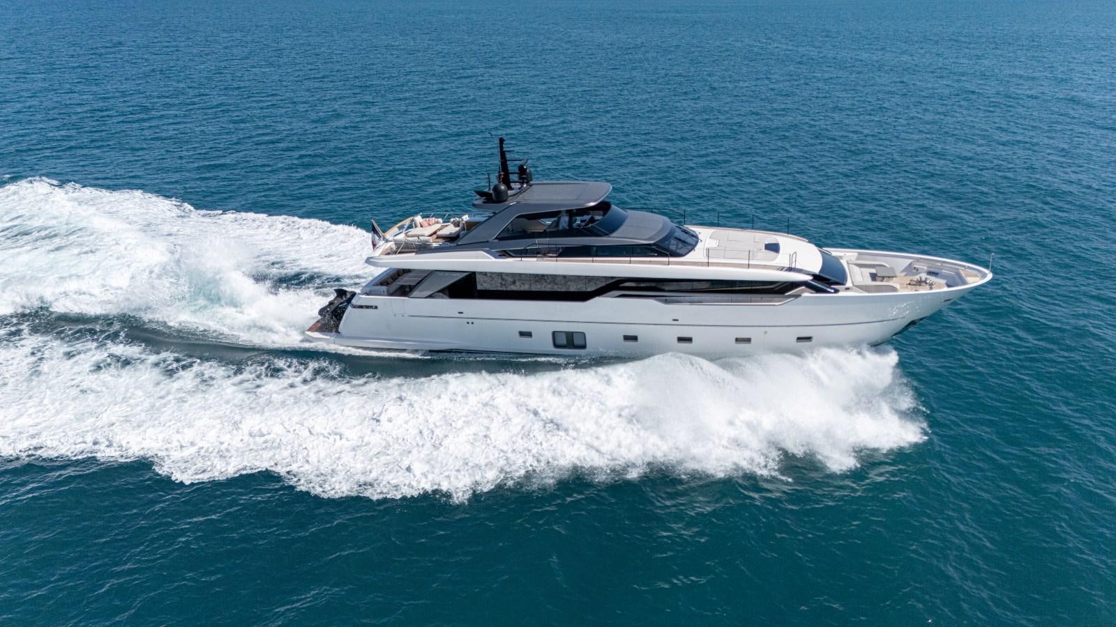 a white yacht in the ocean aboard REGINE Yacht for Sale