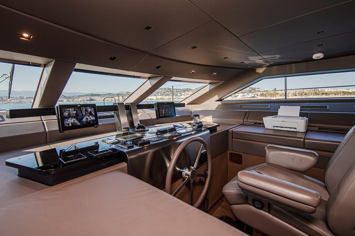 a room with a desk and computer aboard REGINE Yacht for Sale