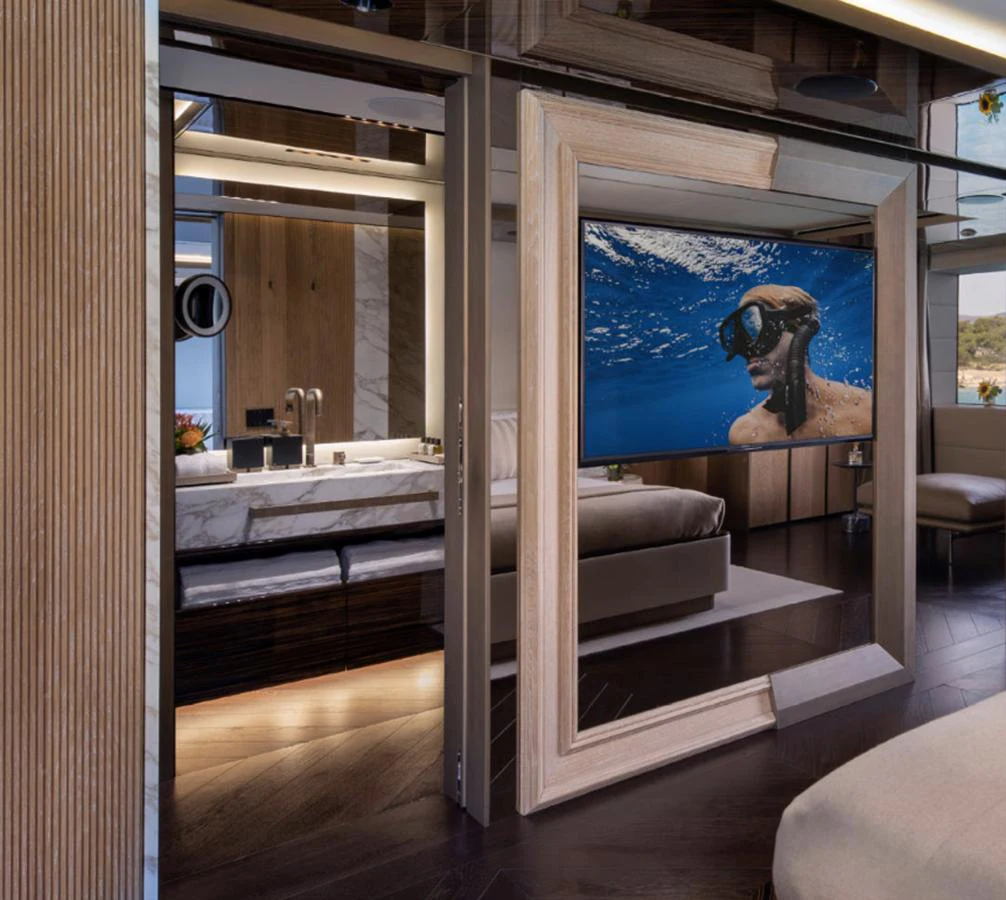 a bathroom with a large mirror aboard ADMIRAL S-FORCE 55 Yacht for Sale