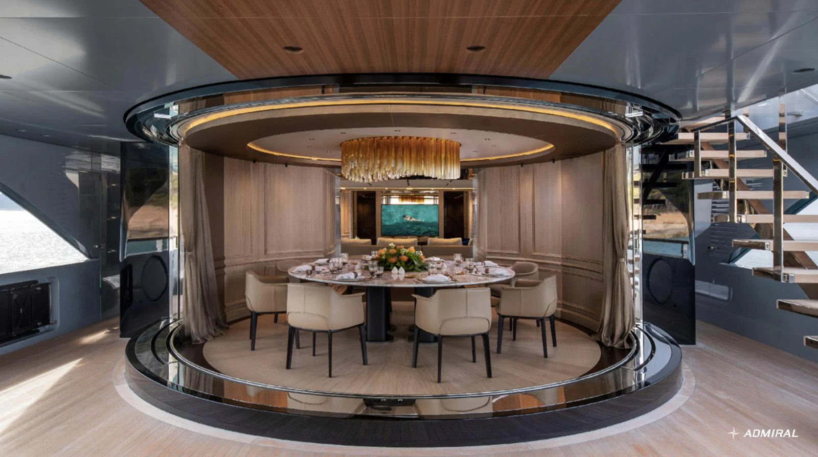 a large room with a table and chairs aboard ADMIRAL S-FORCE 55 Yacht for Sale