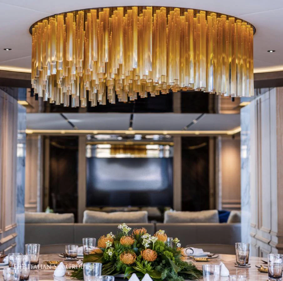 a room with a table and chairs aboard ADMIRAL S-FORCE 55 Yacht for Sale