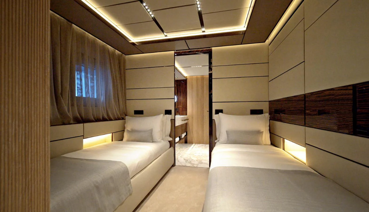 a room with a couple of beds aboard ADMIRAL S-FORCE 55 Yacht for Sale