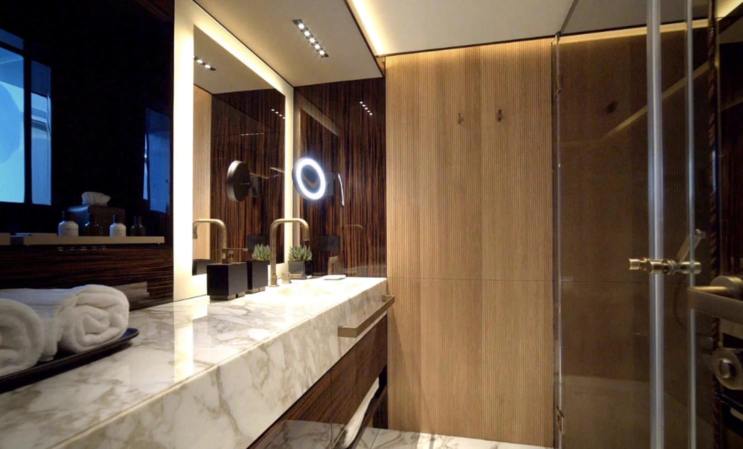 a bathroom with a large countertop aboard ADMIRAL S-FORCE 55 Yacht for Sale