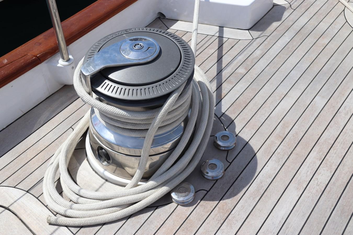 a metal object on a wood surface aboard KEEWAYDIN Yacht for Sale
