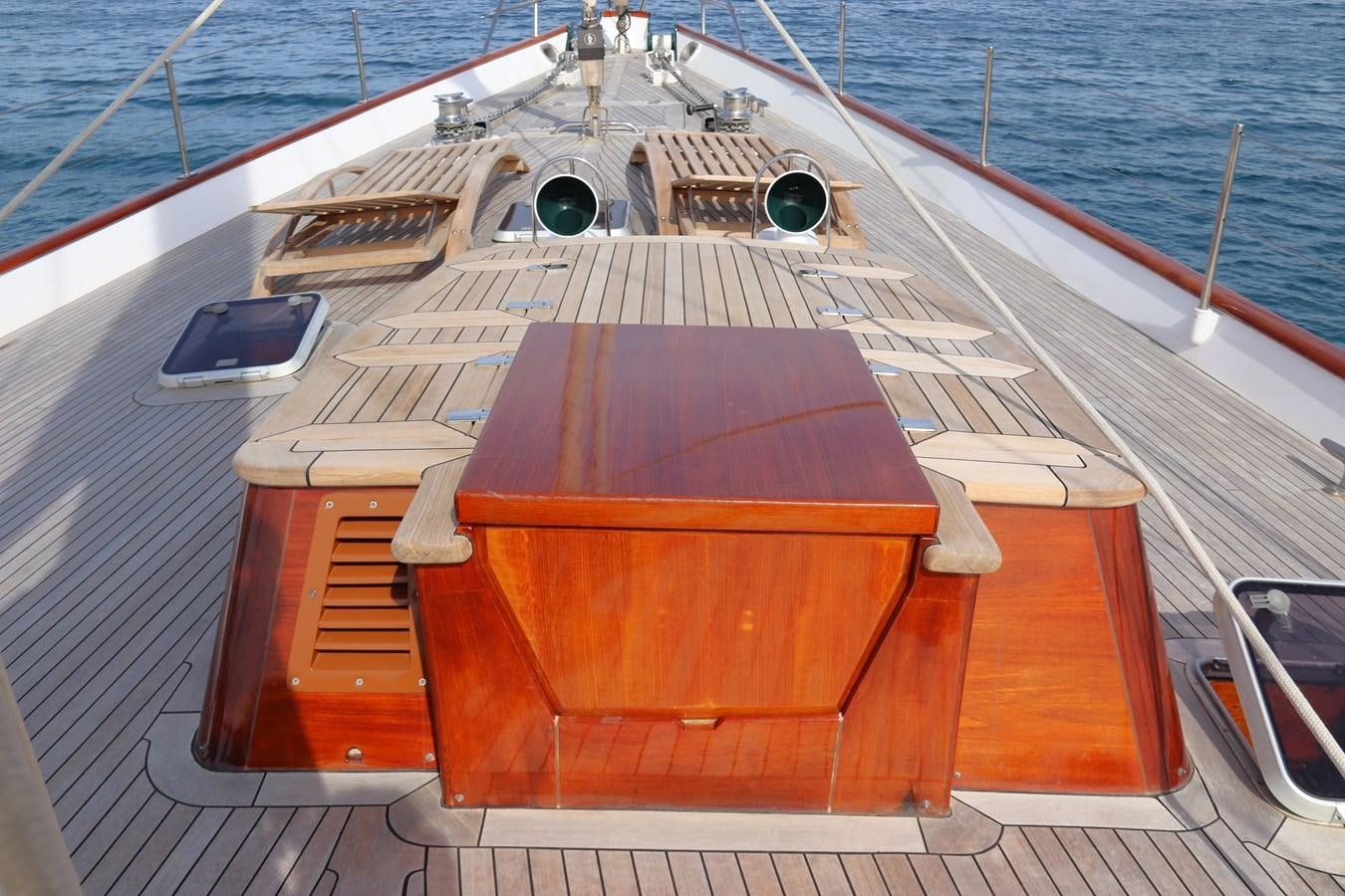 a wooden boat on the water aboard KEEWAYDIN Yacht for Sale