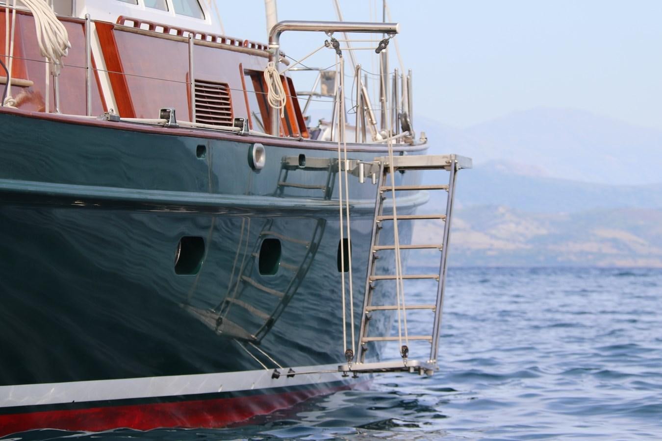 a large boat in the water aboard KEEWAYDIN Yacht for Sale