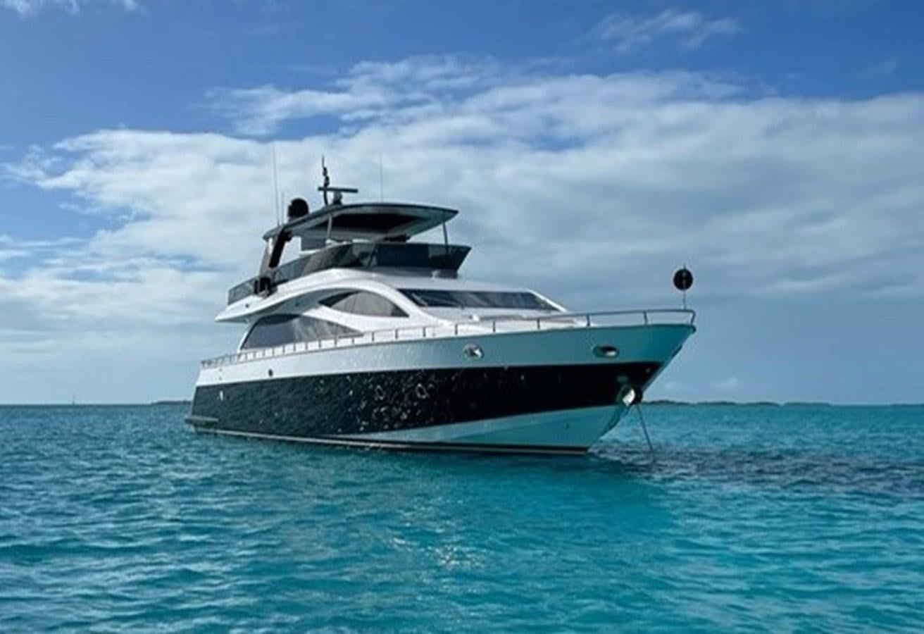 a white yacht in the water aboard AMER 94 Yacht for Sale