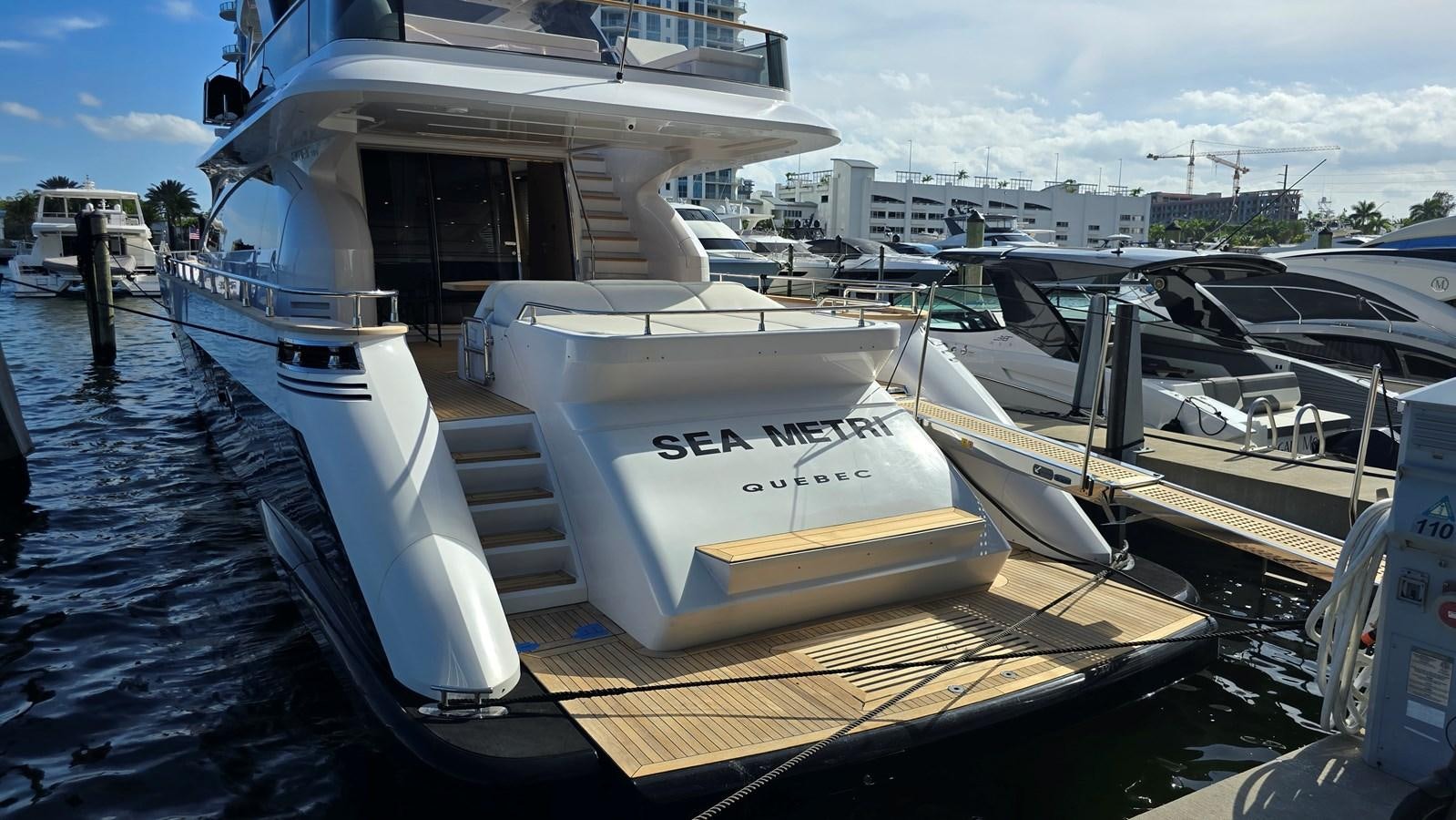a boat docked at a pier aboard AMER 94 Yacht for Sale