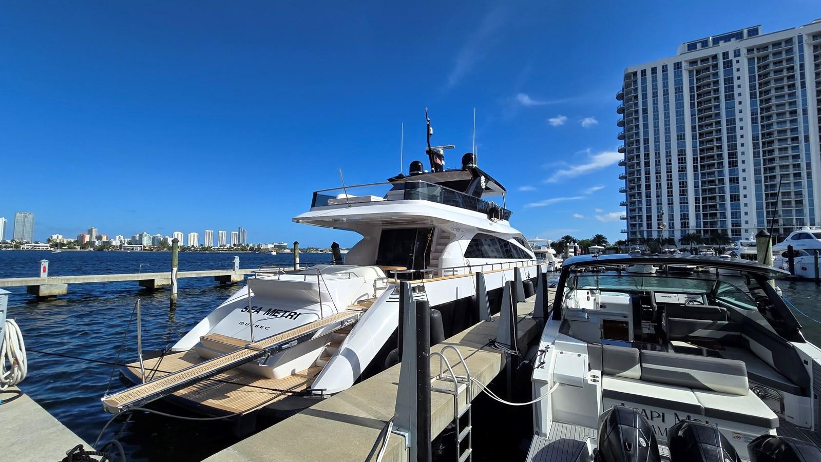 a boat docked at a pier aboard AMER 94 Yacht for Sale