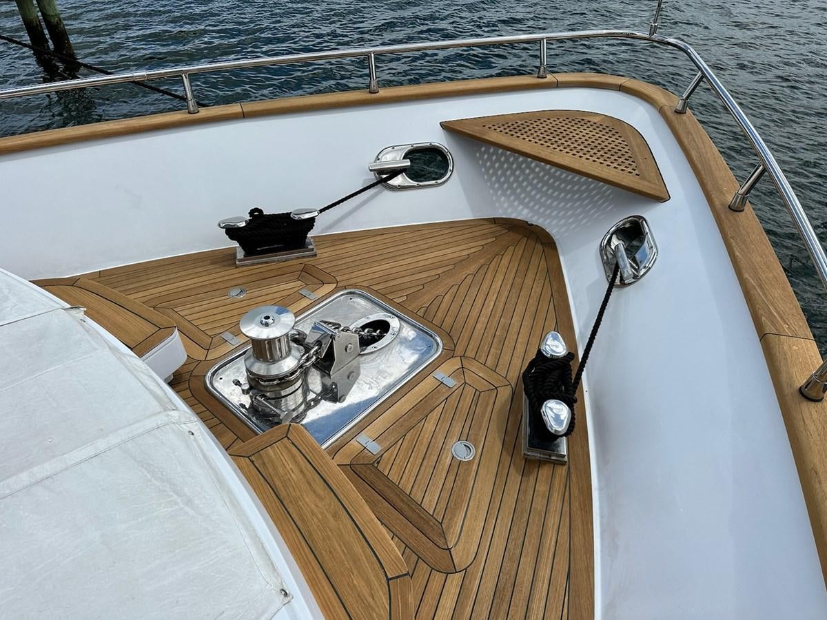 a wooden boat with a metal bar on it aboard AMER 94 Yacht for Sale