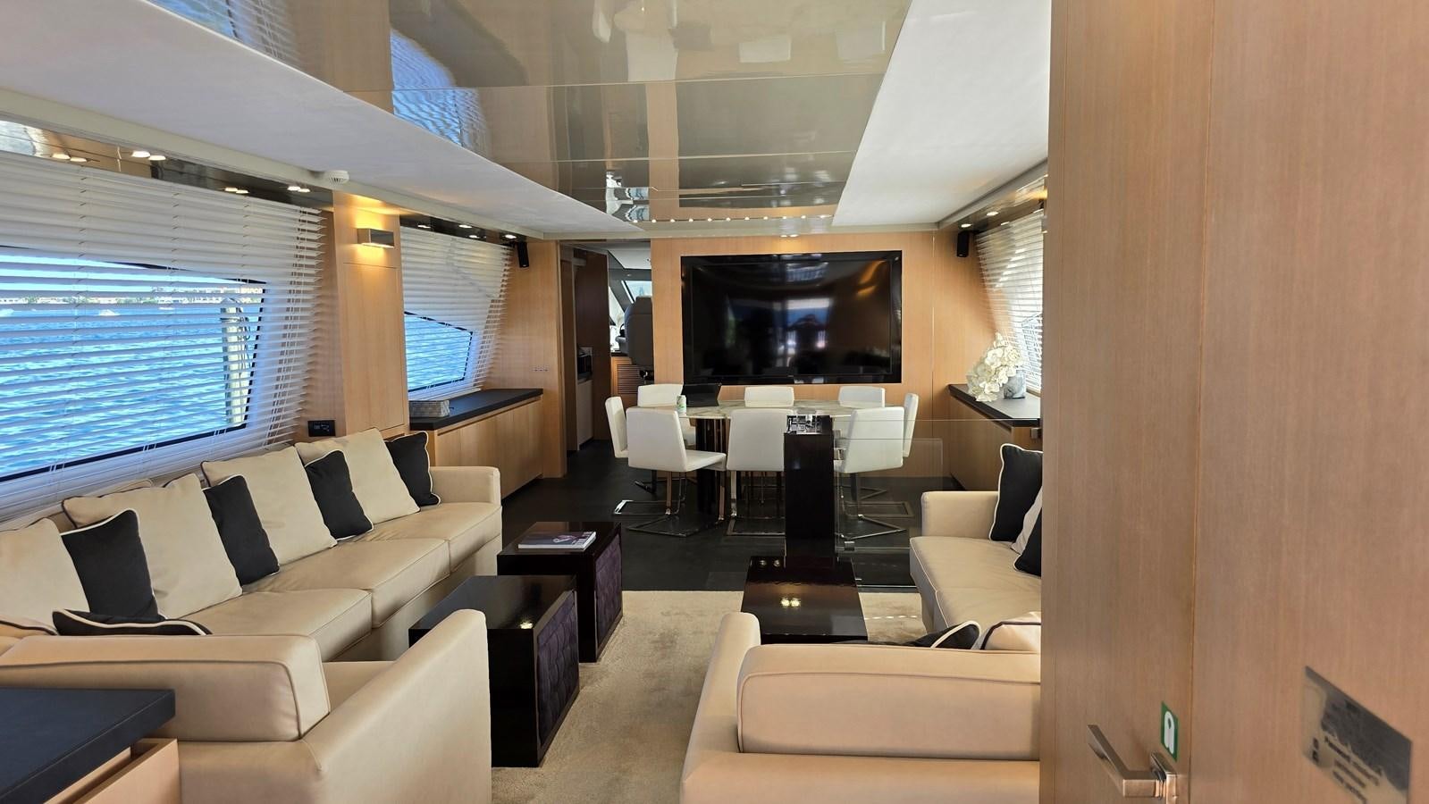a room with a large screen aboard AMER 94 Yacht for Sale