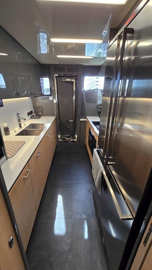 a bathroom with a large glass shower aboard AMER 94 Yacht for Sale