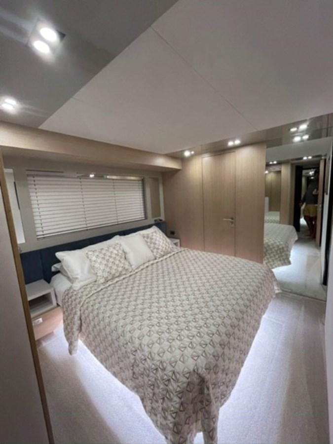 a bed in a hotel room aboard AMER 94 Yacht for Sale