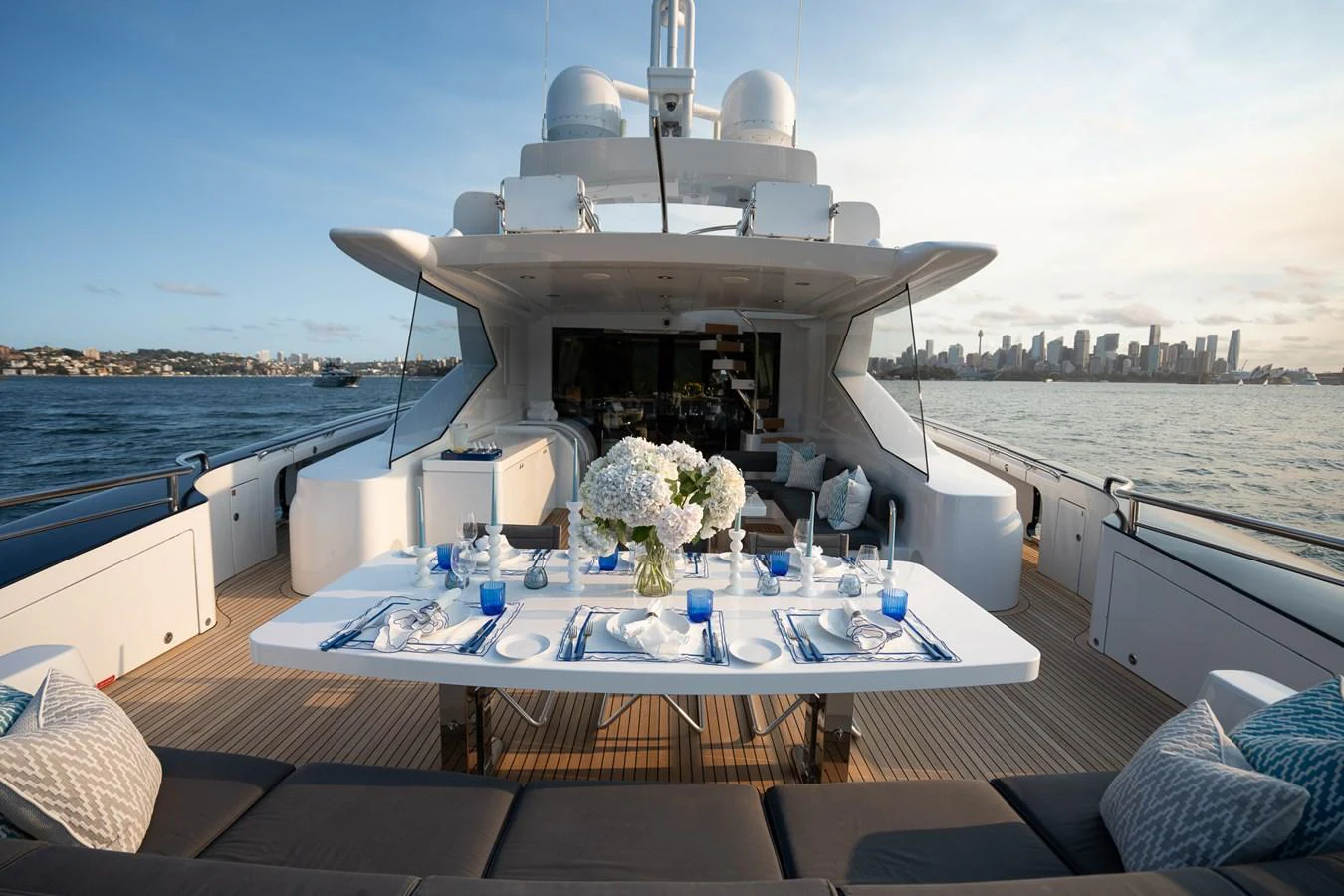 a large white table on a boat aboard QUANTUM Yacht for Sale