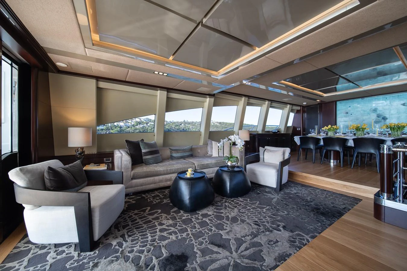 a large living room with a large window aboard QUANTUM Yacht for Sale