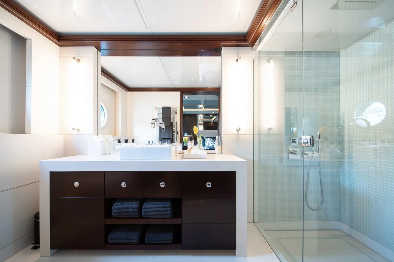 a bathroom with a glass shower aboard QUANTUM Yacht for Sale