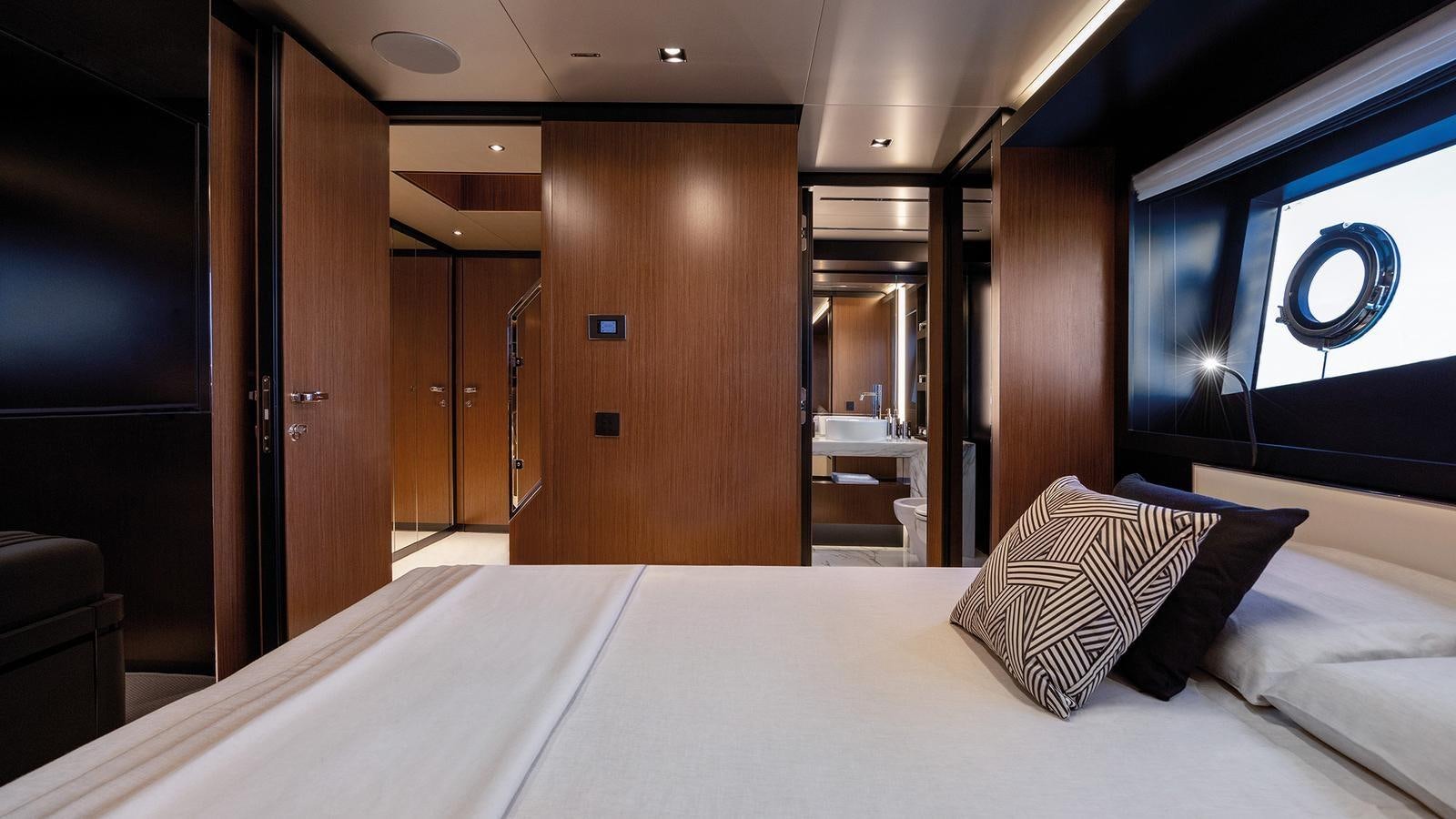 a bed in a room aboard THREE GRACES Yacht for Sale
