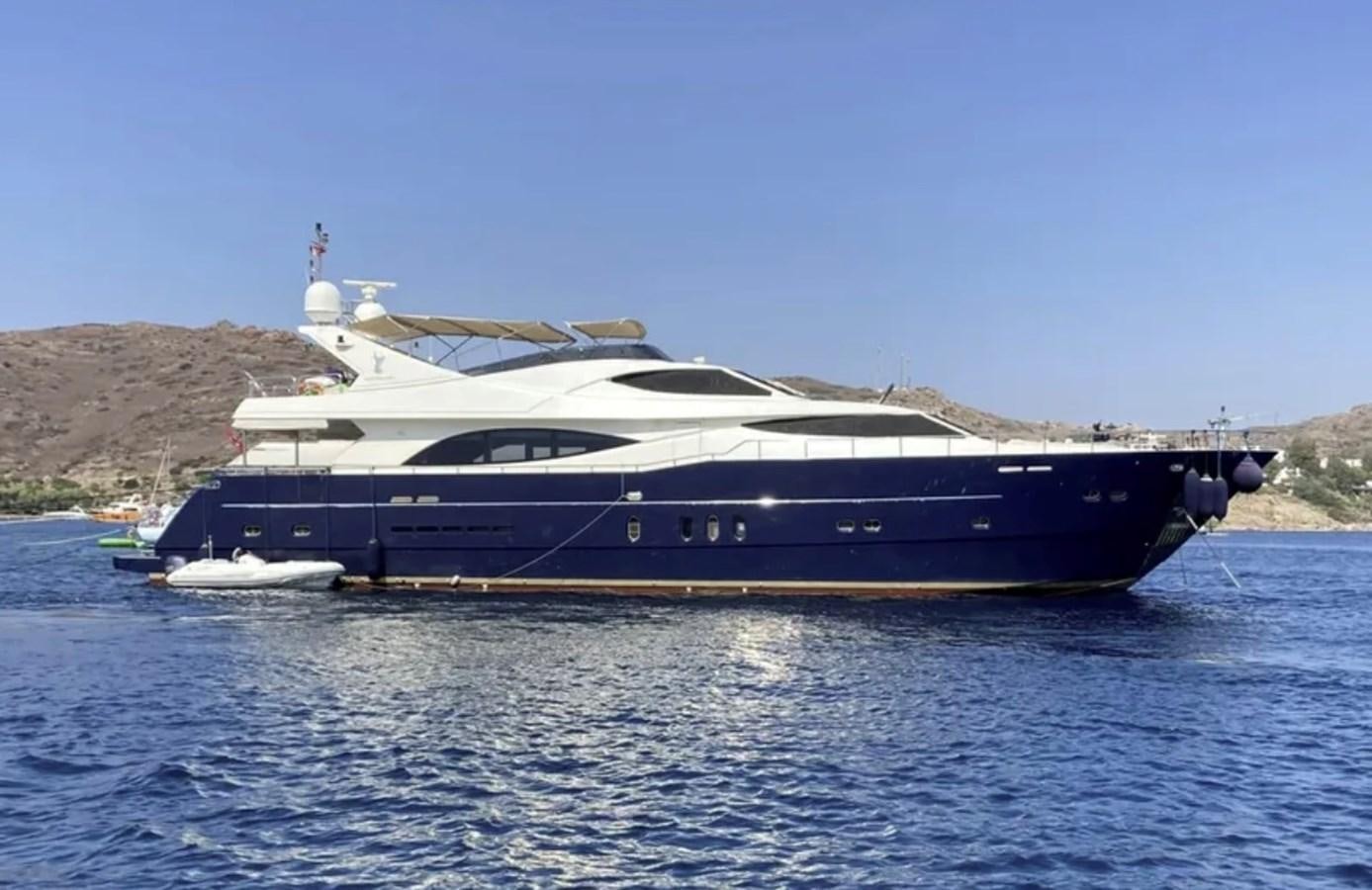 a large boat on the water aboard NIKE III Yacht for Sale