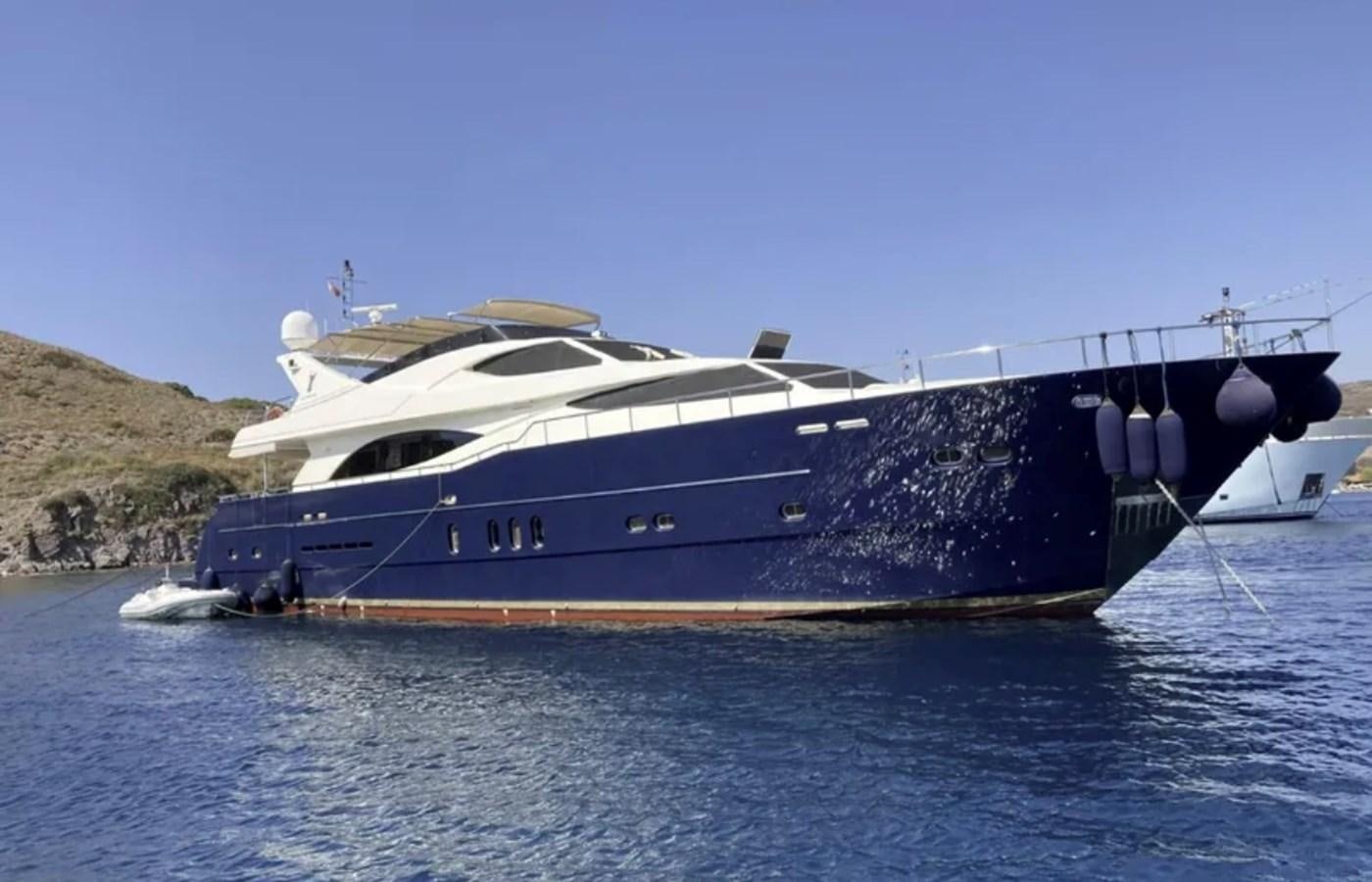 a large boat on the water aboard NIKE III Yacht for Sale