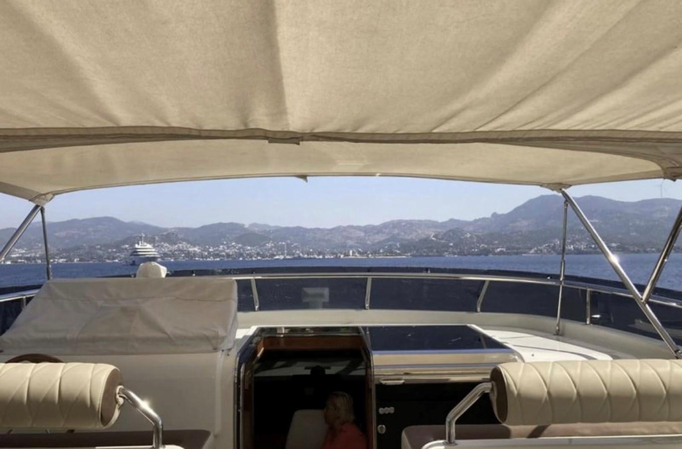 a person sitting in a boat aboard NIKE III Yacht for Sale