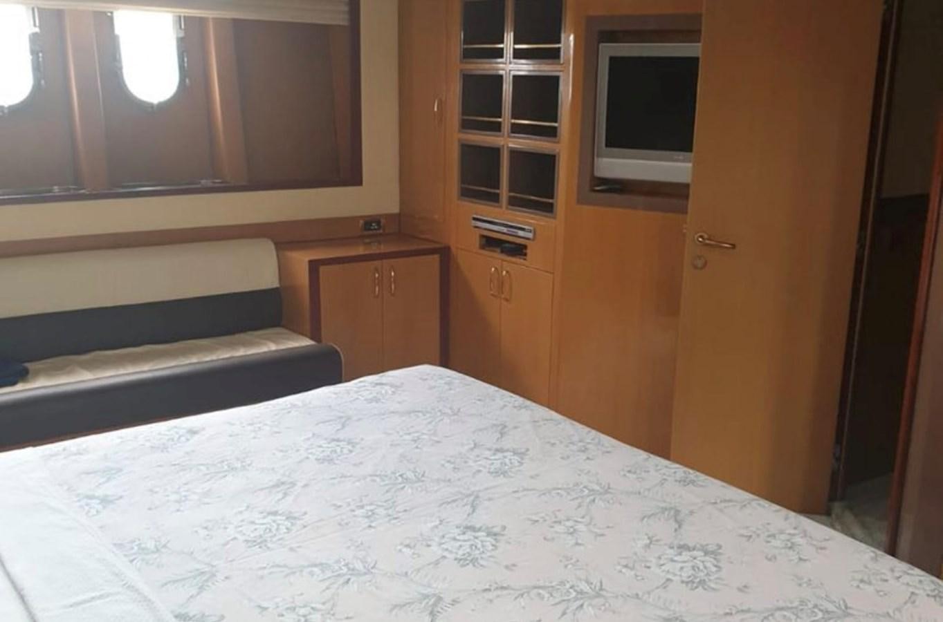 a bed in a room aboard NIKE III Yacht for Sale