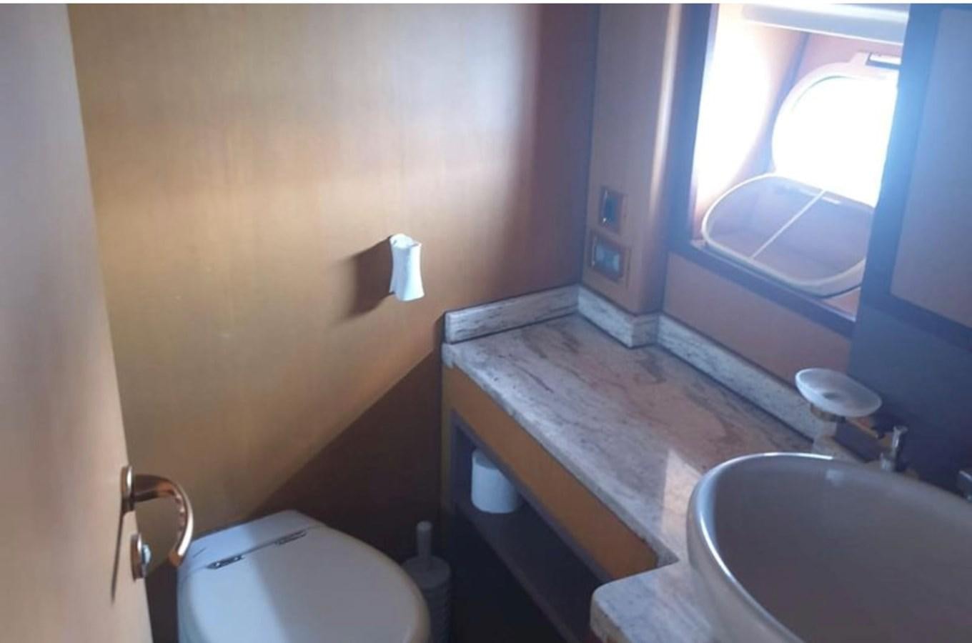 a bathroom with a sink and toilet aboard NIKE III Yacht for Sale