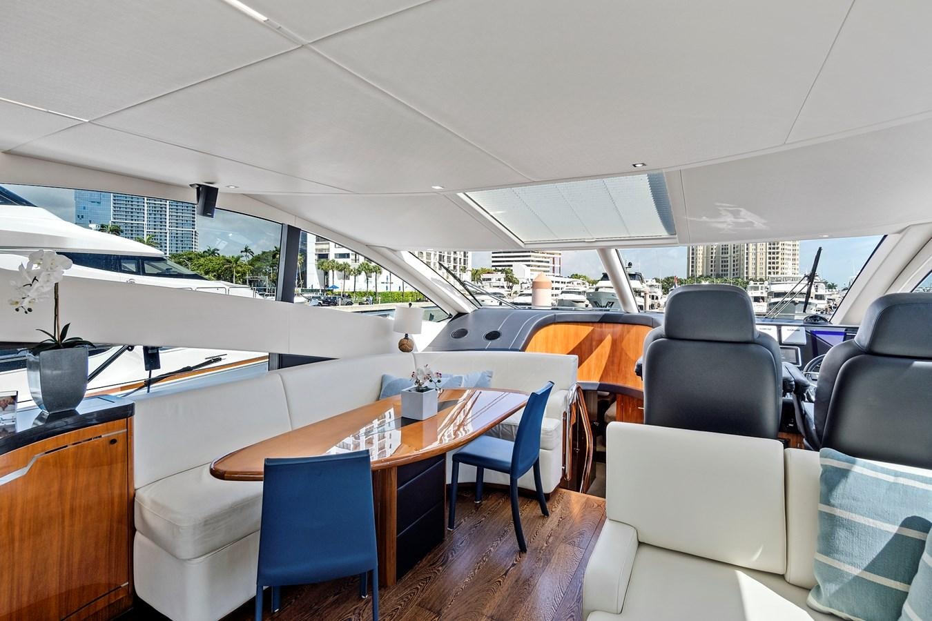 a room with tables and chairs aboard ONCE AROUND Yacht for Sale