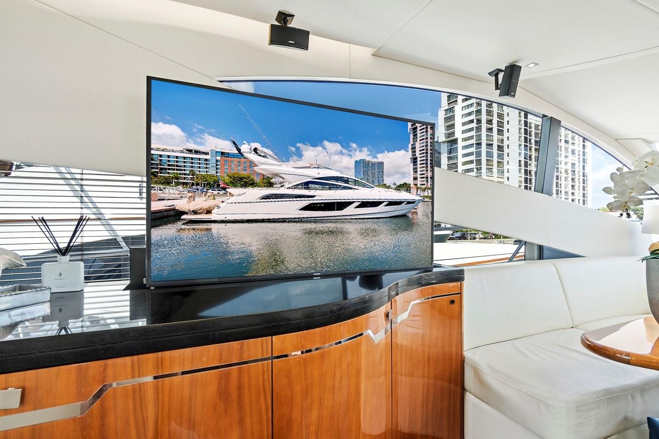a large window with a city in the background aboard ONCE AROUND Yacht for Sale