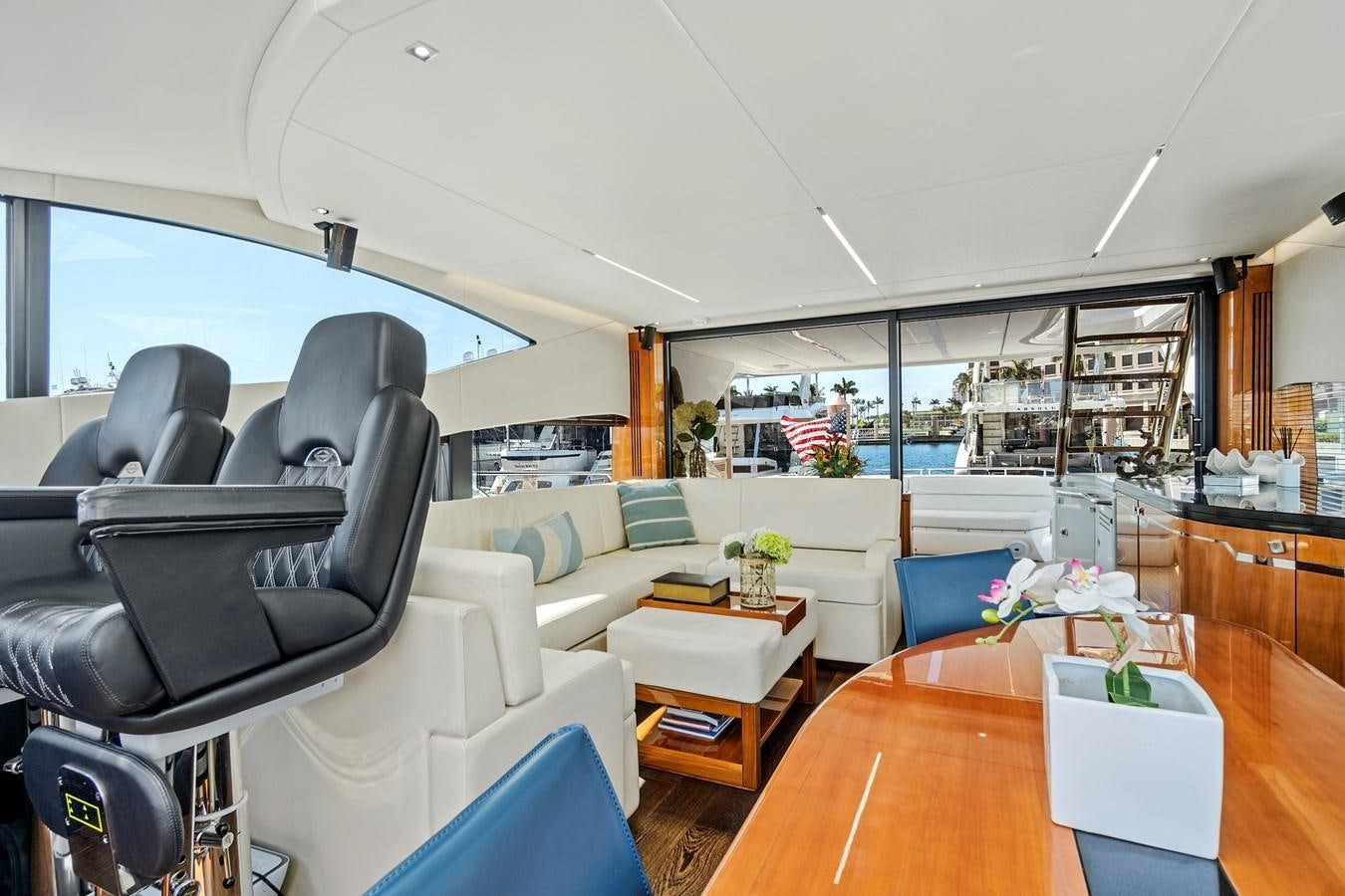 a living room with a large window aboard ONCE AROUND Yacht for Sale