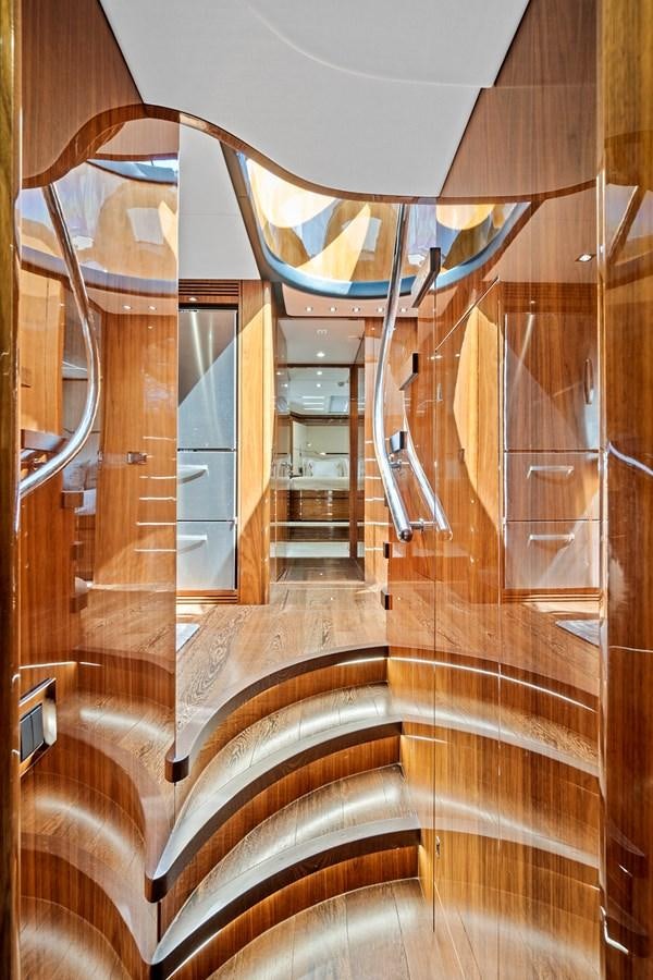 a large bathroom with glass walls aboard ONCE AROUND Yacht for Sale