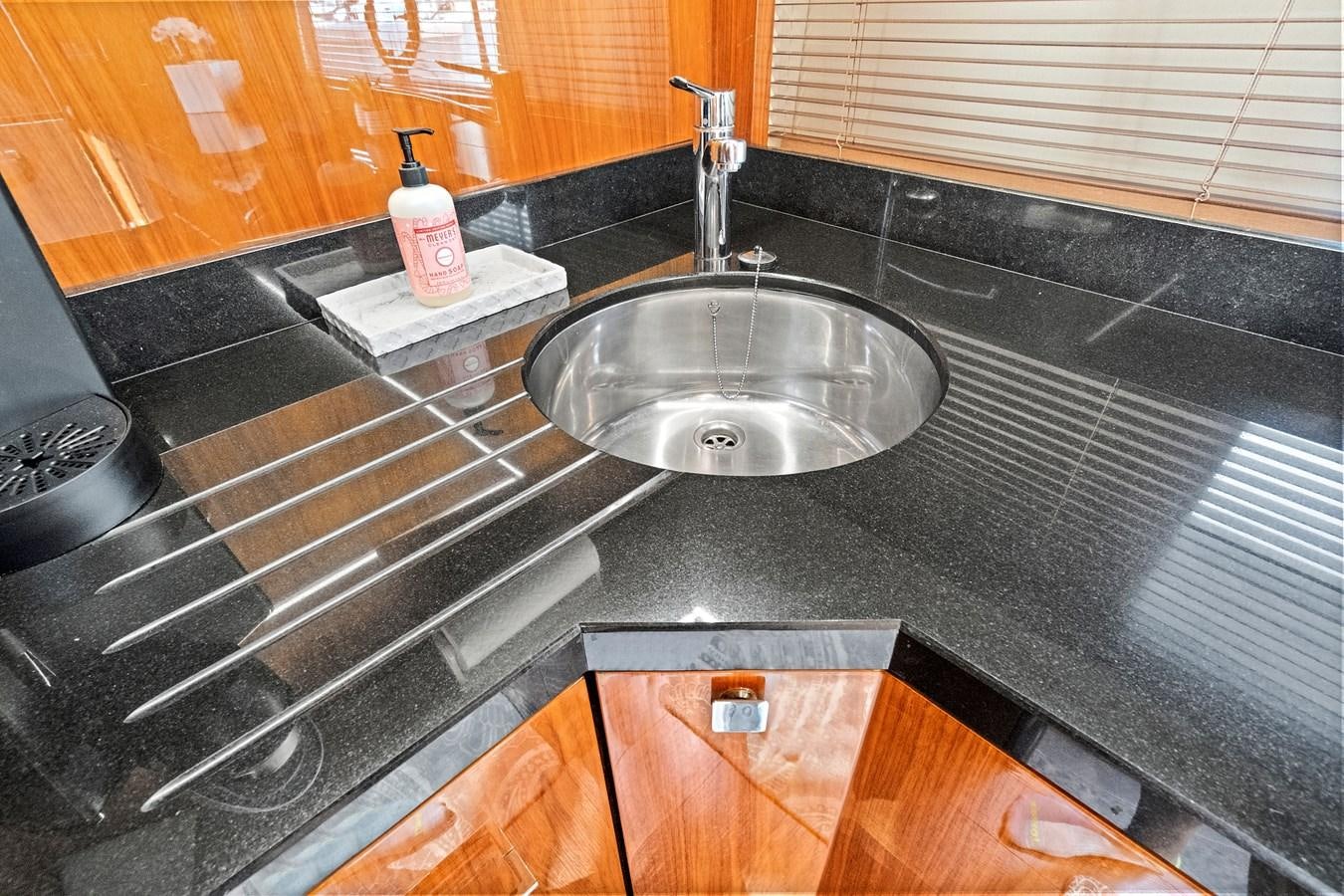 a kitchen sink with a faucet aboard ONCE AROUND Yacht for Sale
