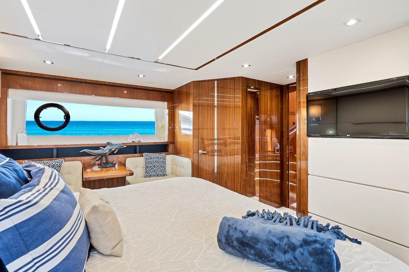 a bedroom with wood walls aboard ONCE AROUND Yacht for Sale
